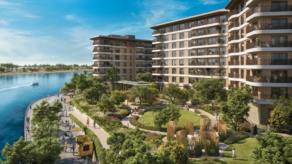 Elegant building exteriors surrounded by greenery in Gardenia Bay Abu Dhabi